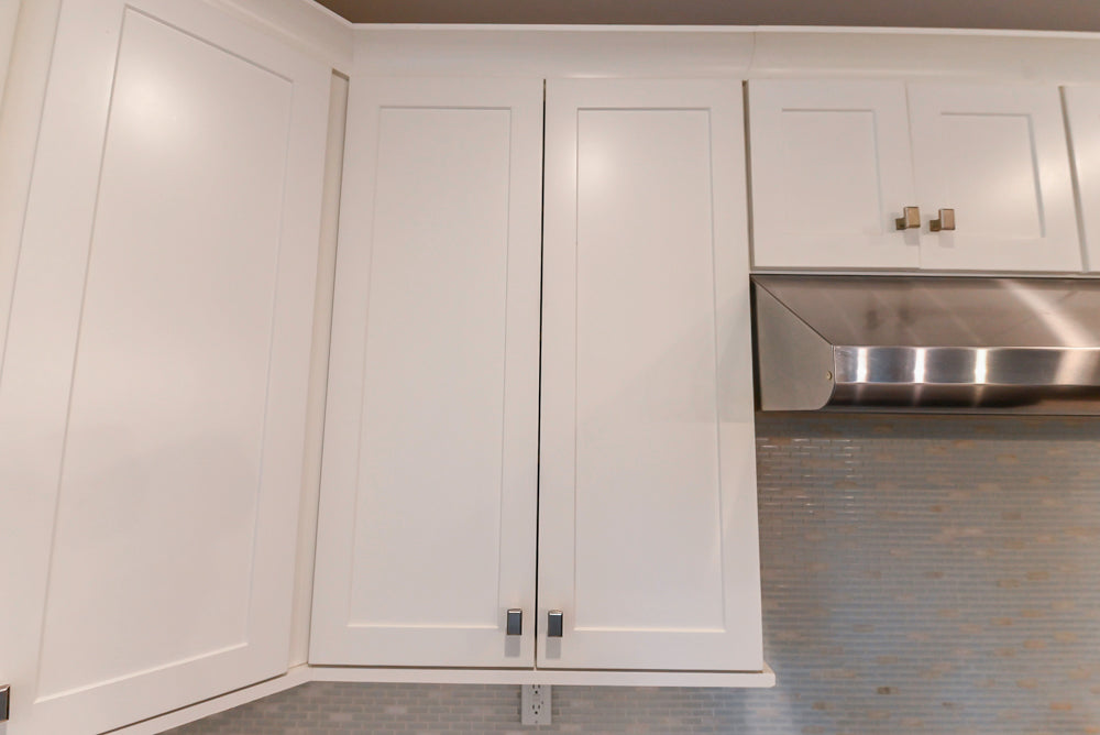 Fabuwood Transitional White Kitchen with Island and White Marble Countertops