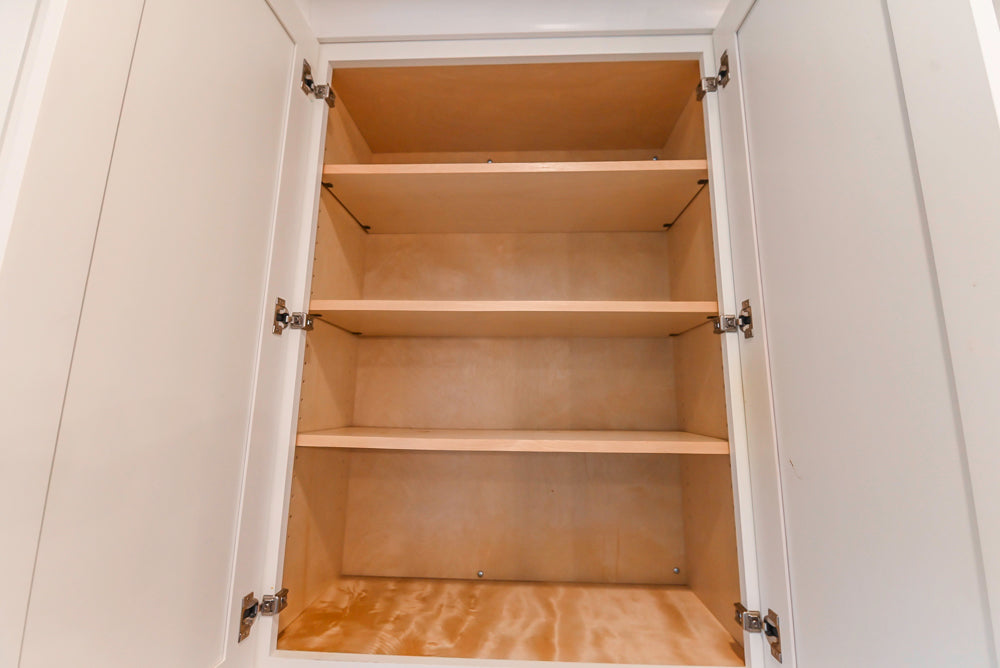 Fabuwood Transitional White Kitchen with Island and White Marble Countertops