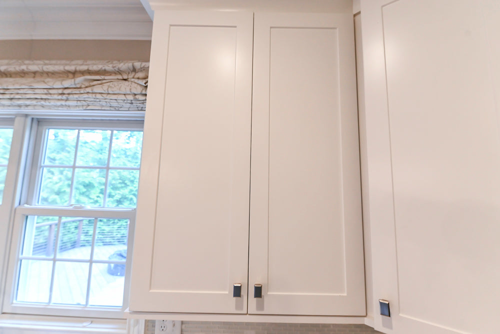 Fabuwood Transitional White Kitchen with Island and White Marble Countertops