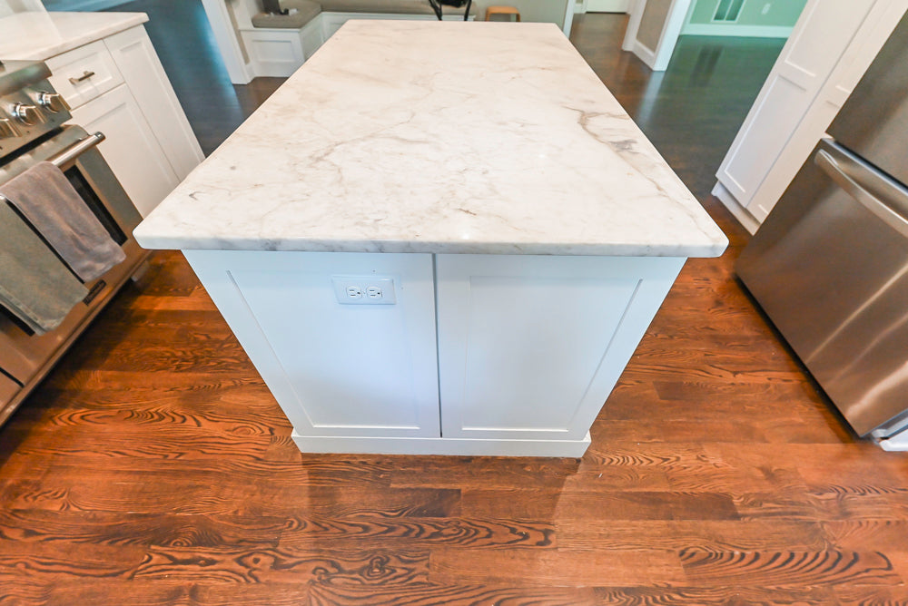 Fabuwood Transitional White Kitchen with Island and White Marble Countertops