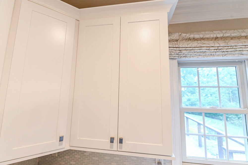 Fabuwood Transitional White Kitchen with Island and White Marble Countertops