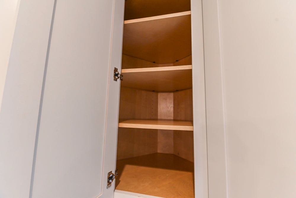Fabuwood Transitional White Kitchen with Island and White Marble Countertops