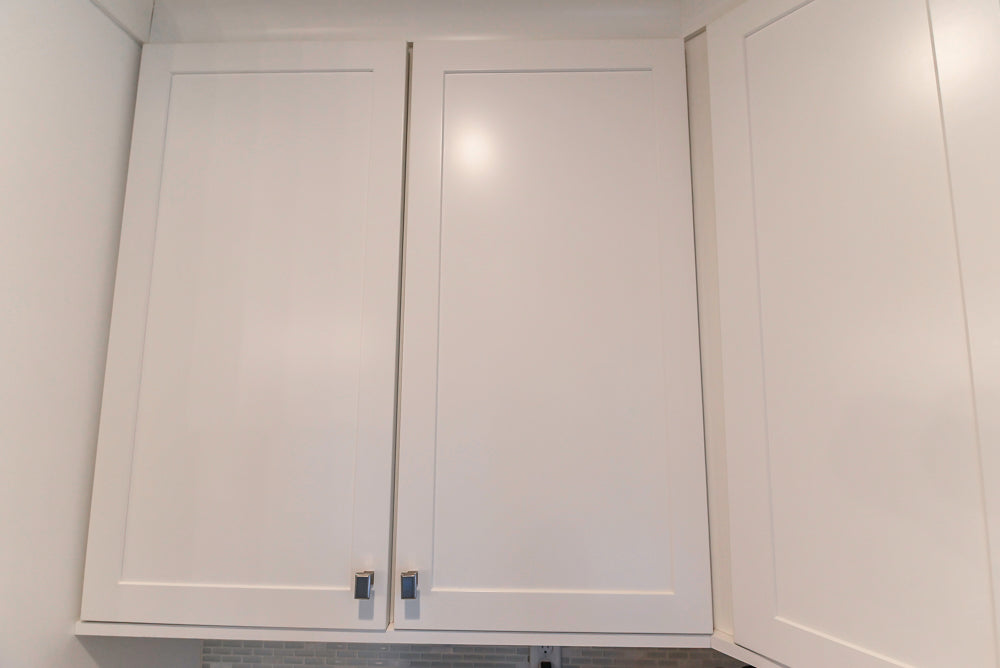 Fabuwood Transitional White Kitchen with Island and White Marble Countertops
