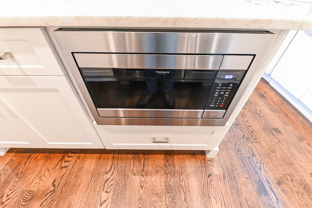 Fabuwood Transitional White Kitchen with Island and White Marble Countertops