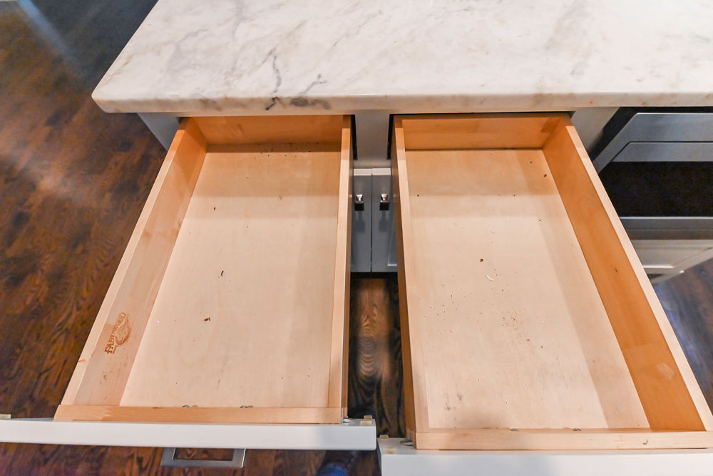 Fabuwood Transitional White Kitchen with Island and White Marble Countertops