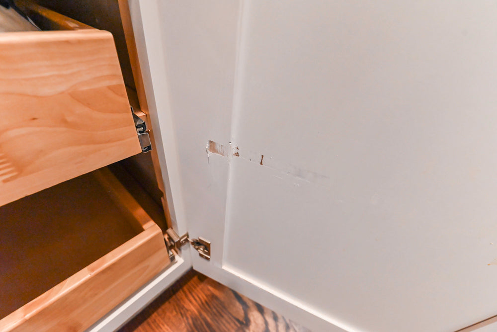 Fabuwood Transitional White Kitchen with Island and White Marble Countertops