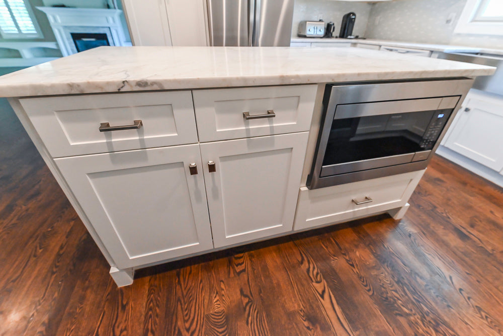 Fabuwood Transitional White Kitchen with Island and White Marble Countertops