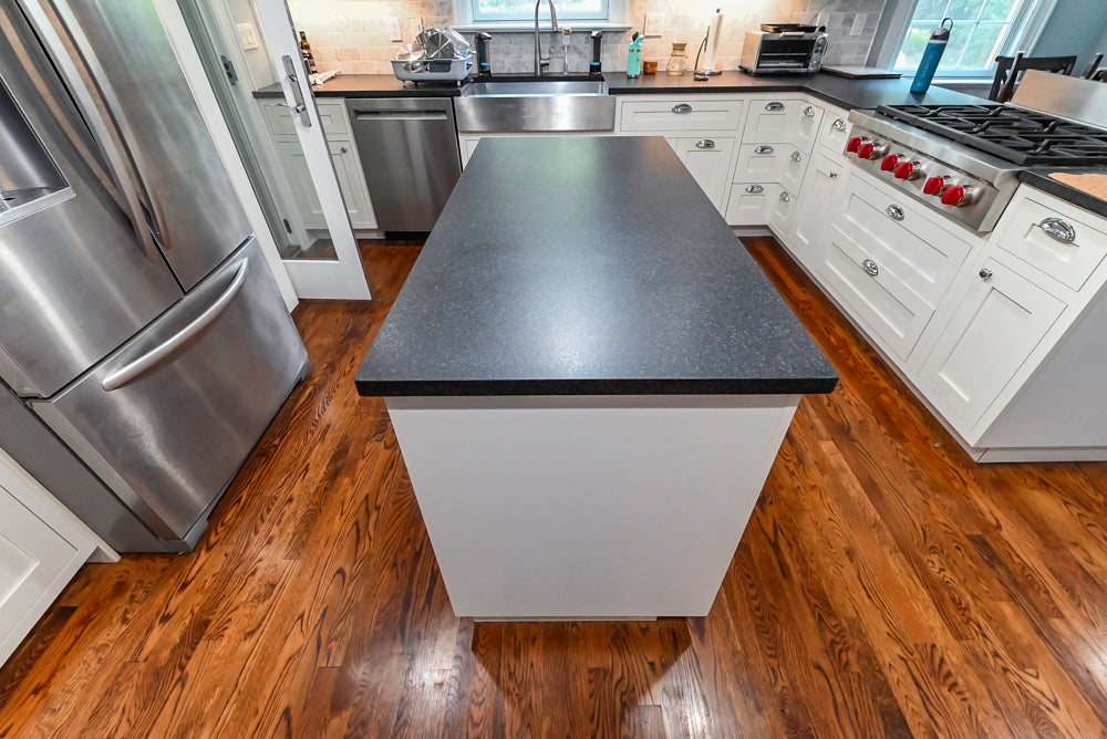 Custom Traditional White Kitchen with Stone Countertops and Appliances