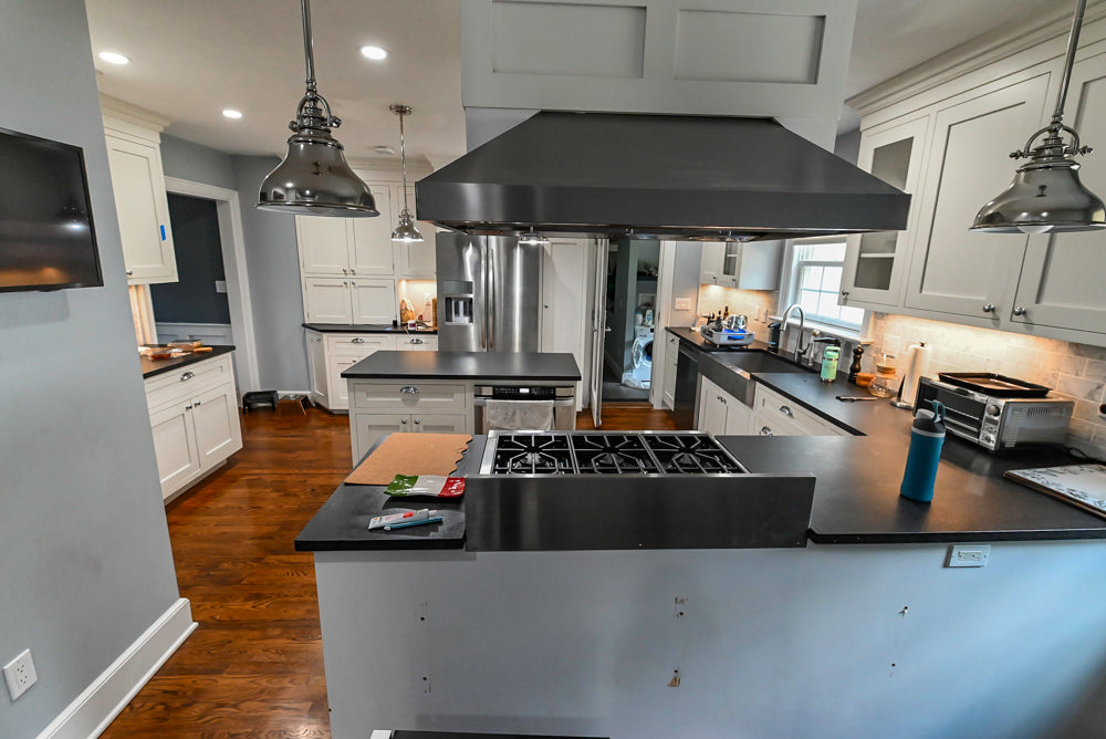 Custom Traditional White Kitchen with Stone Countertops and Appliances
