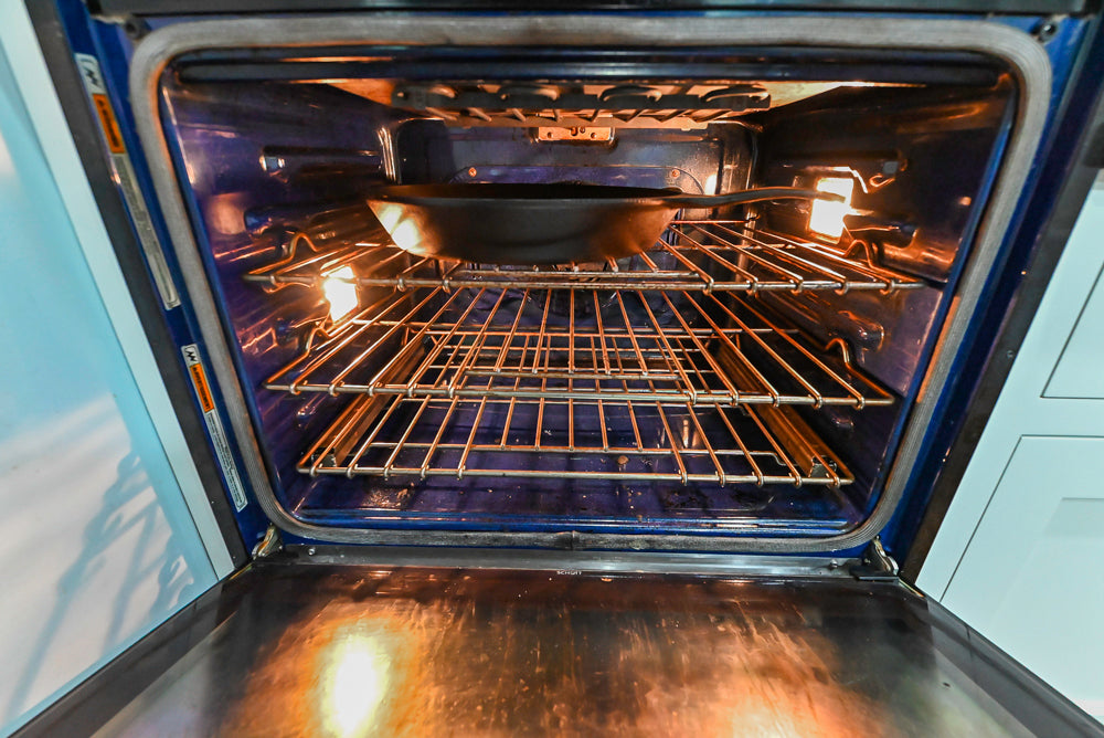 Custom Traditional White Kitchen with Stone Countertops and Appliances
