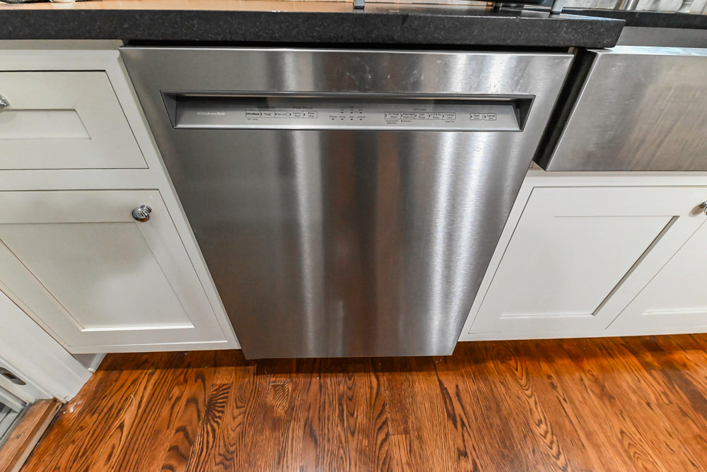 Custom Traditional White Kitchen with Stone Countertops and Appliances