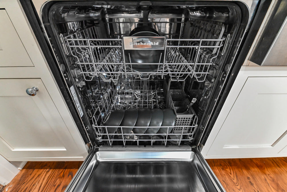 Custom Traditional White Kitchen with Stone Countertops and Appliances