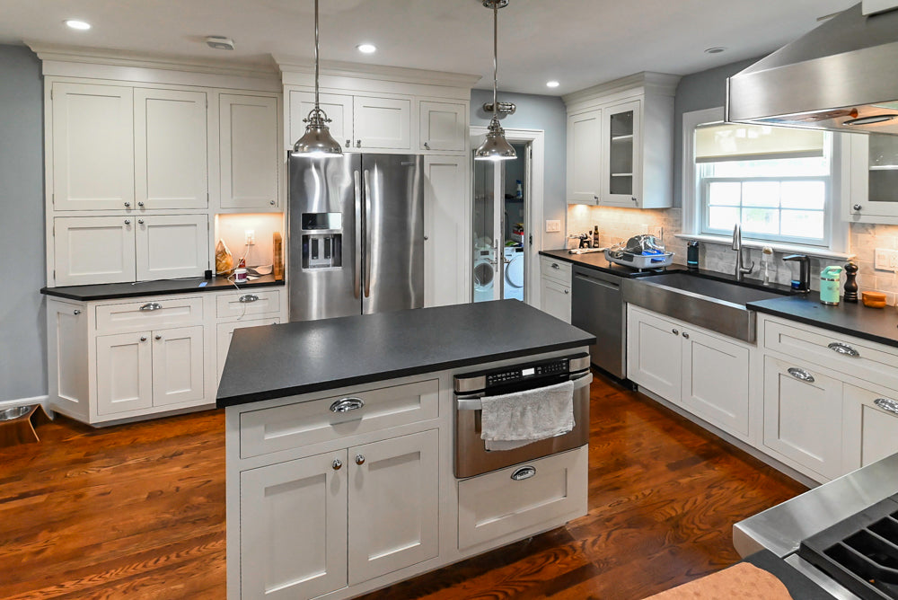 Custom Traditional White Kitchen with Stone Countertops and Appliances