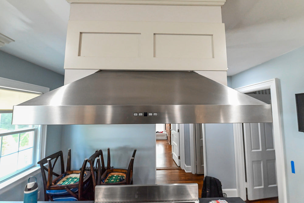 Custom Traditional White Kitchen with Stone Countertops and Appliances