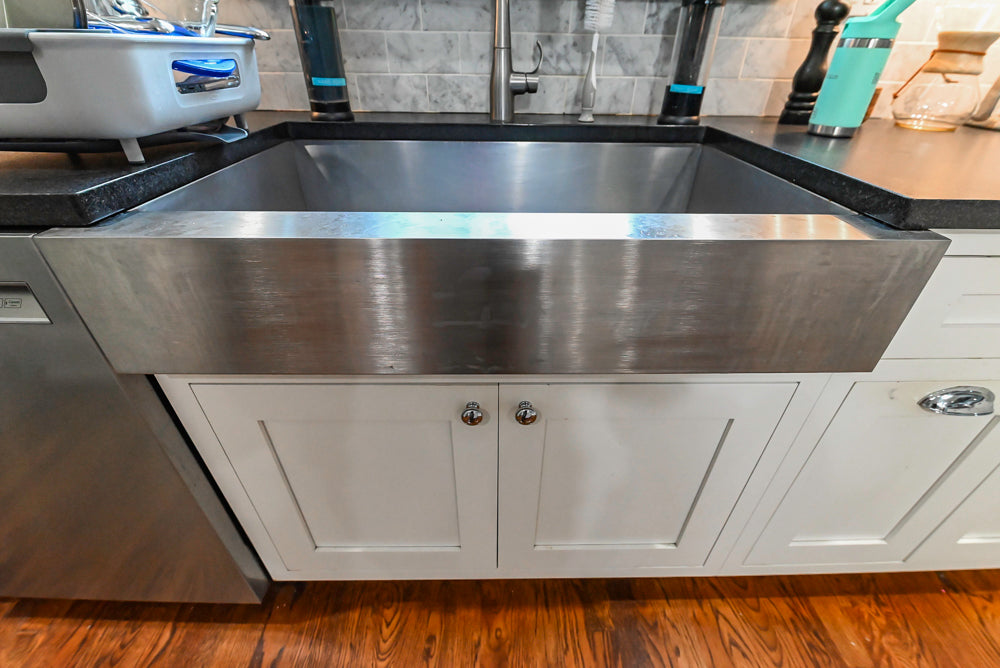 Custom Traditional White Kitchen with Stone Countertops and Appliances