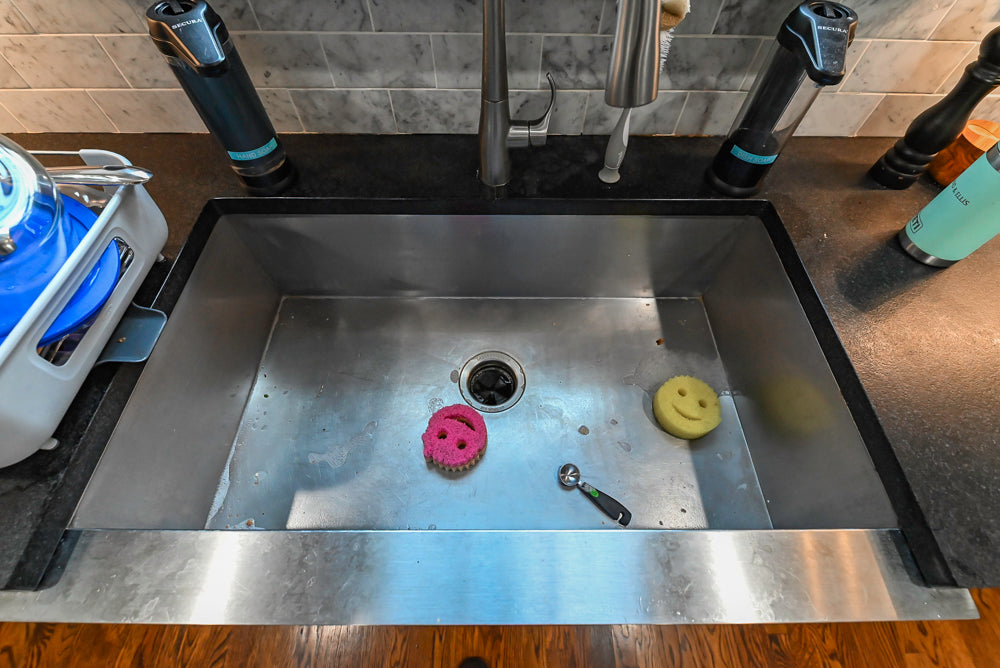 Custom Traditional White Kitchen with Stone Countertops and Appliances