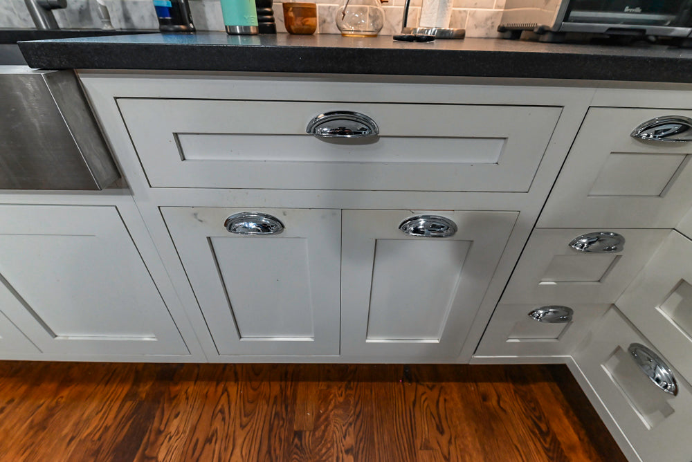 Custom Traditional White Kitchen with Stone Countertops and Appliances