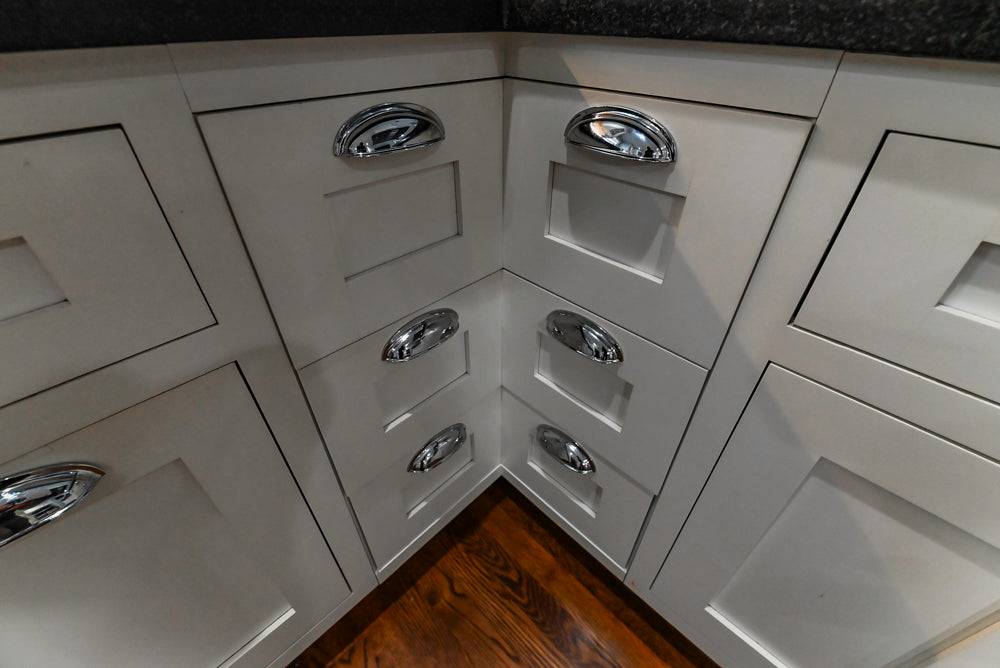 Custom Traditional White Kitchen with Stone Countertops and Appliances