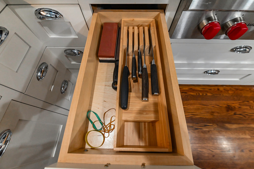 Custom Traditional White Kitchen with Stone Countertops and Appliances