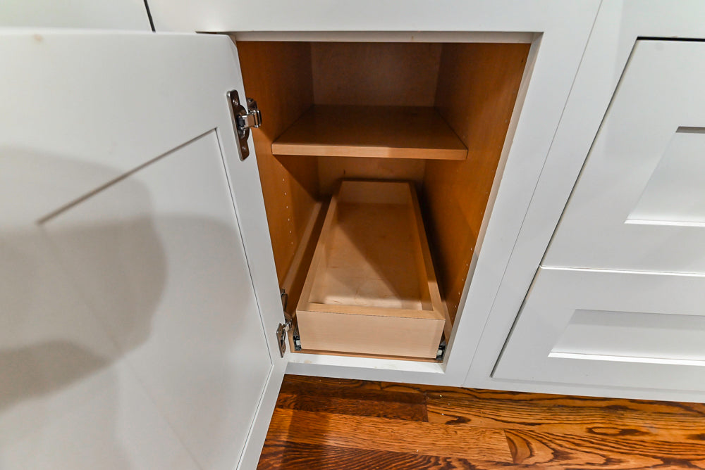 Custom Traditional White Kitchen with Stone Countertops and Appliances
