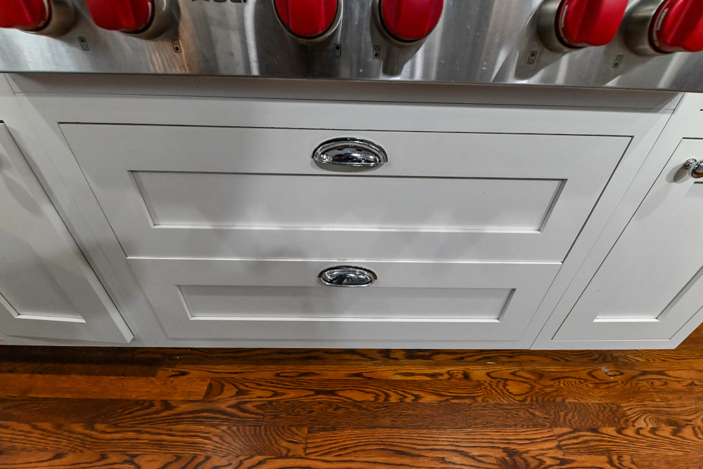 Custom Traditional White Kitchen with Stone Countertops and Appliances