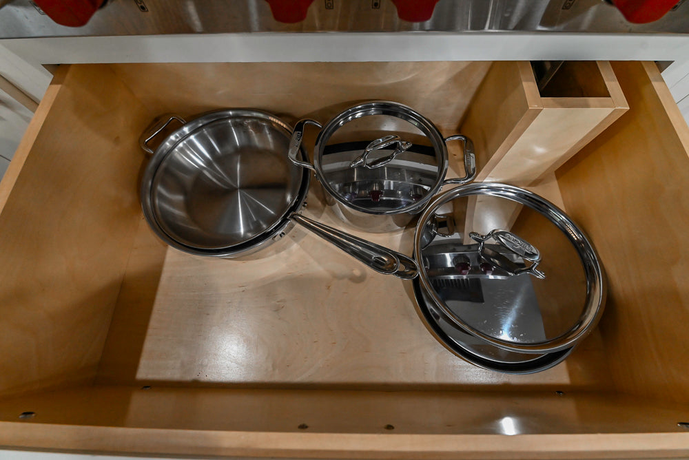 Custom Traditional White Kitchen with Stone Countertops and Appliances