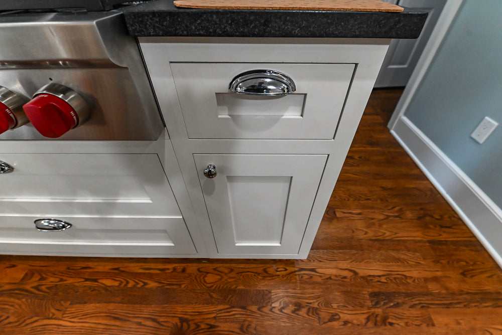 Custom Traditional White Kitchen with Stone Countertops and Appliances