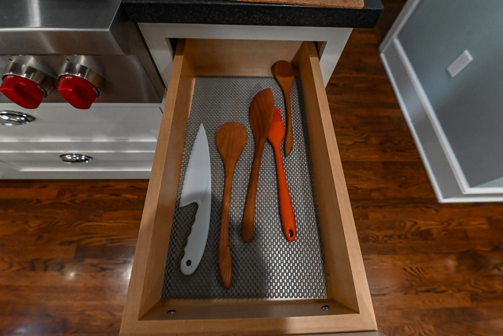 Custom Traditional White Kitchen with Stone Countertops and Appliances