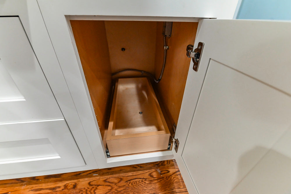 Custom Traditional White Kitchen with Stone Countertops and Appliances