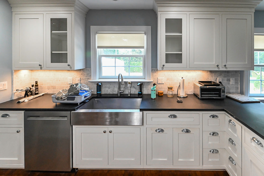 Custom Traditional White Kitchen with Stone Countertops and Appliances
