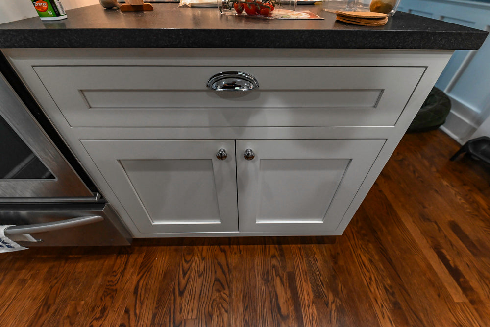 Custom Traditional White Kitchen with Stone Countertops and Appliances