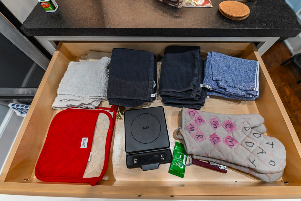 Custom Traditional White Kitchen with Stone Countertops and Appliances