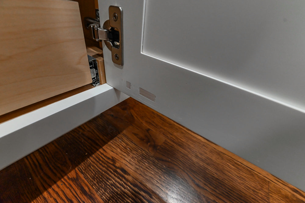 Custom Traditional White Kitchen with Stone Countertops and Appliances