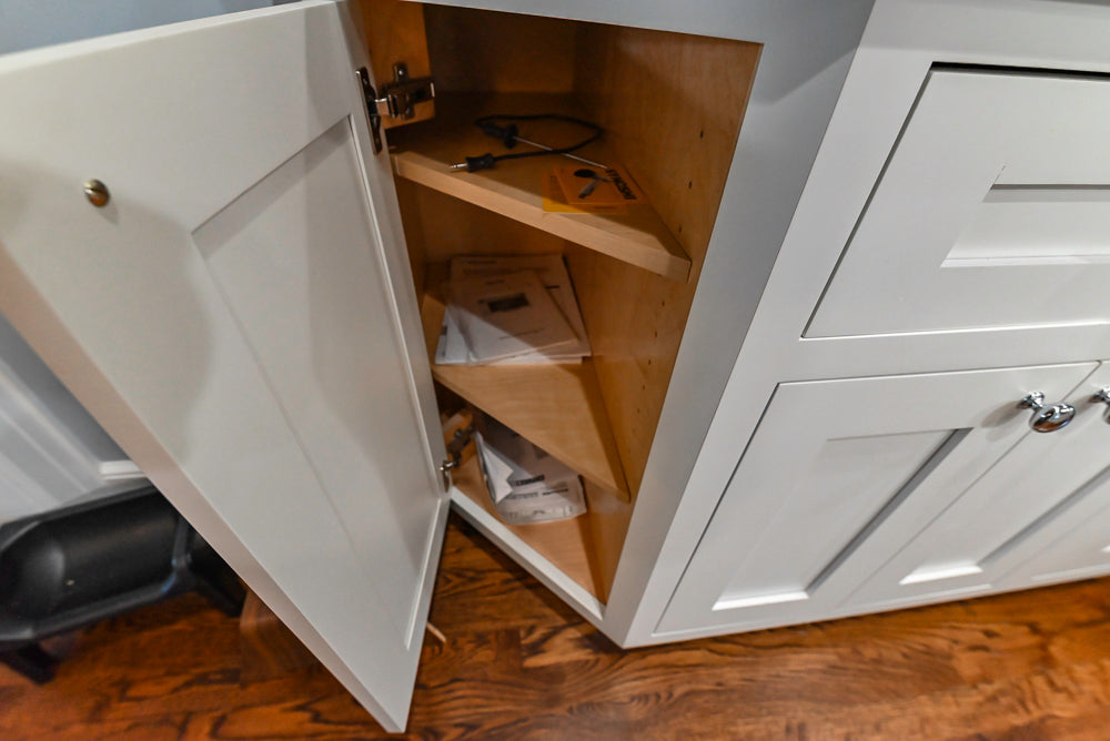 Custom Traditional White Kitchen with Stone Countertops and Appliances