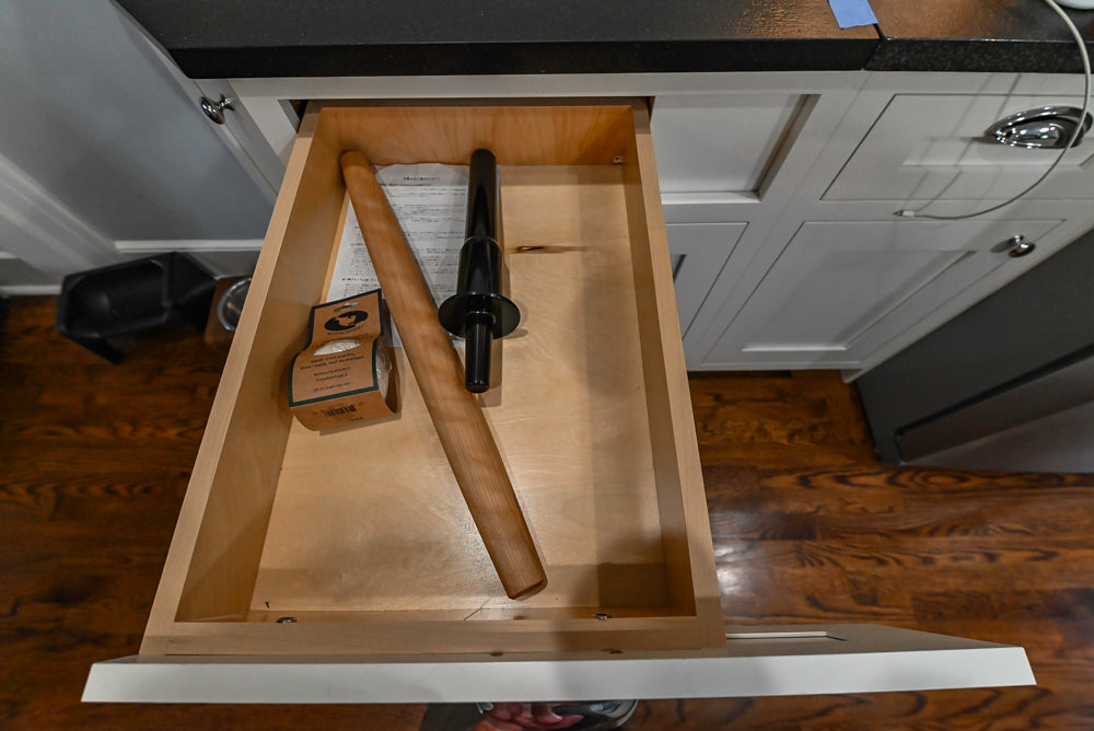Custom Traditional White Kitchen with Stone Countertops and Appliances