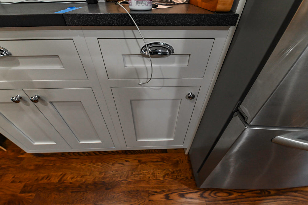 Custom Traditional White Kitchen with Stone Countertops and Appliances