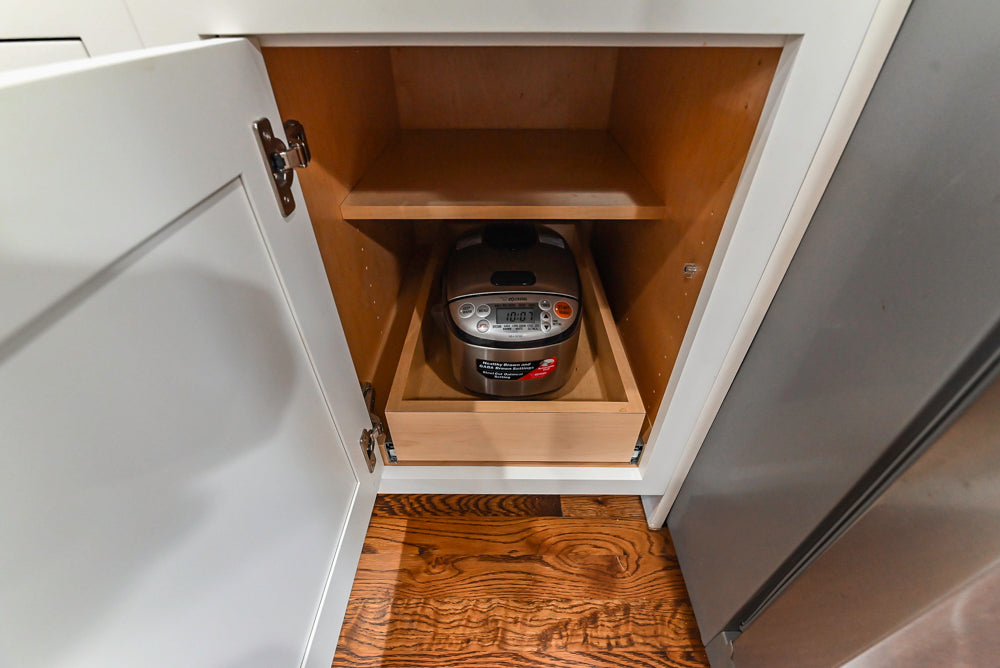 Custom Traditional White Kitchen with Stone Countertops and Appliances