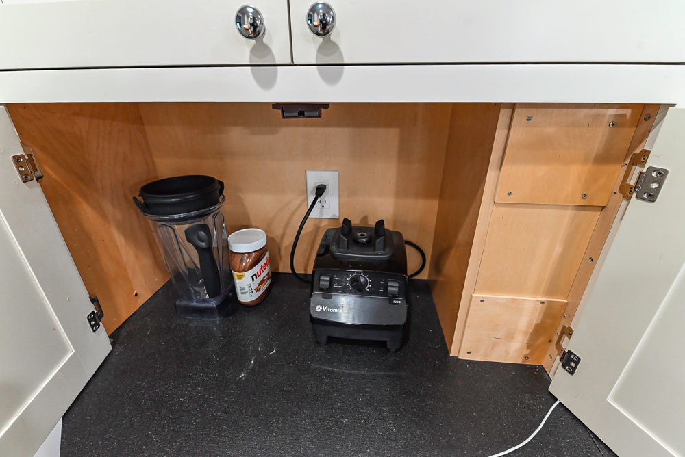Custom Traditional White Kitchen with Stone Countertops and Appliances