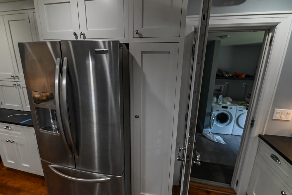 Custom Traditional White Kitchen with Stone Countertops and Appliances