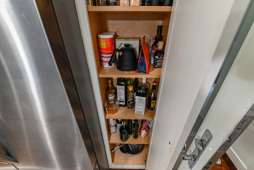 Custom Traditional White Kitchen with Stone Countertops and Appliances
