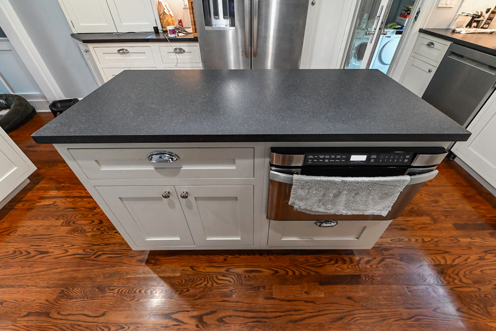 Custom Traditional White Kitchen with Stone Countertops and Appliances
