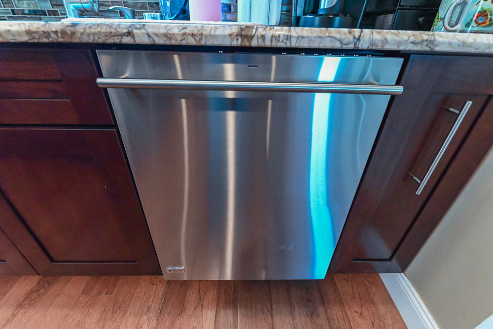 Kraftmaid Transitional Dark Wooden Kitchen with Marble Countertops and GE Monogram Appliances