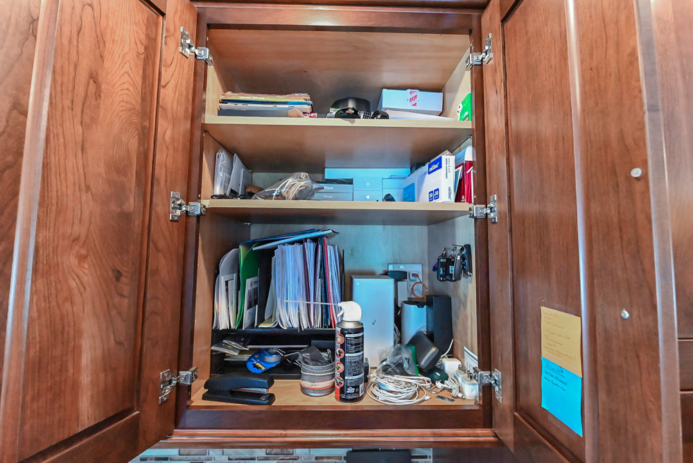 Kraftmaid Transitional Dark Wooden Kitchen with Marble Countertops and GE Monogram Appliances