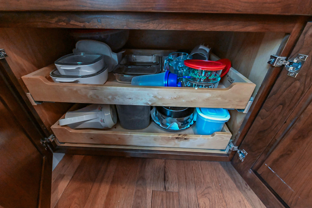 Kraftmaid Transitional Dark Wooden Kitchen with Marble Countertops and GE Monogram Appliances