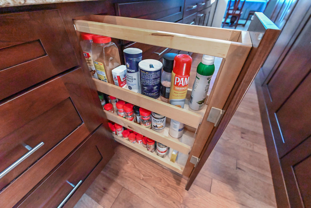 Kraftmaid Transitional Dark Wooden Kitchen with Marble Countertops and GE Monogram Appliances