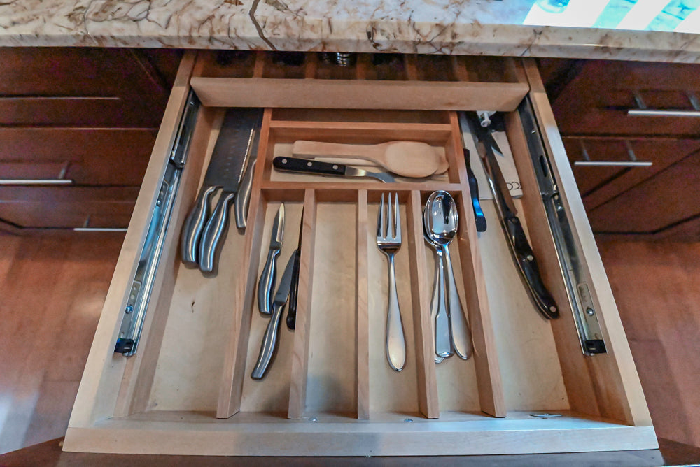 Kraftmaid Transitional Dark Wooden Kitchen with Marble Countertops and GE Monogram Appliances