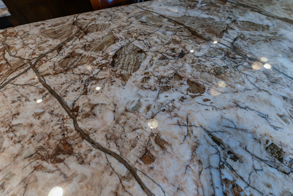 Kraftmaid Transitional Dark Wooden Kitchen with Marble Countertops and GE Monogram Appliances