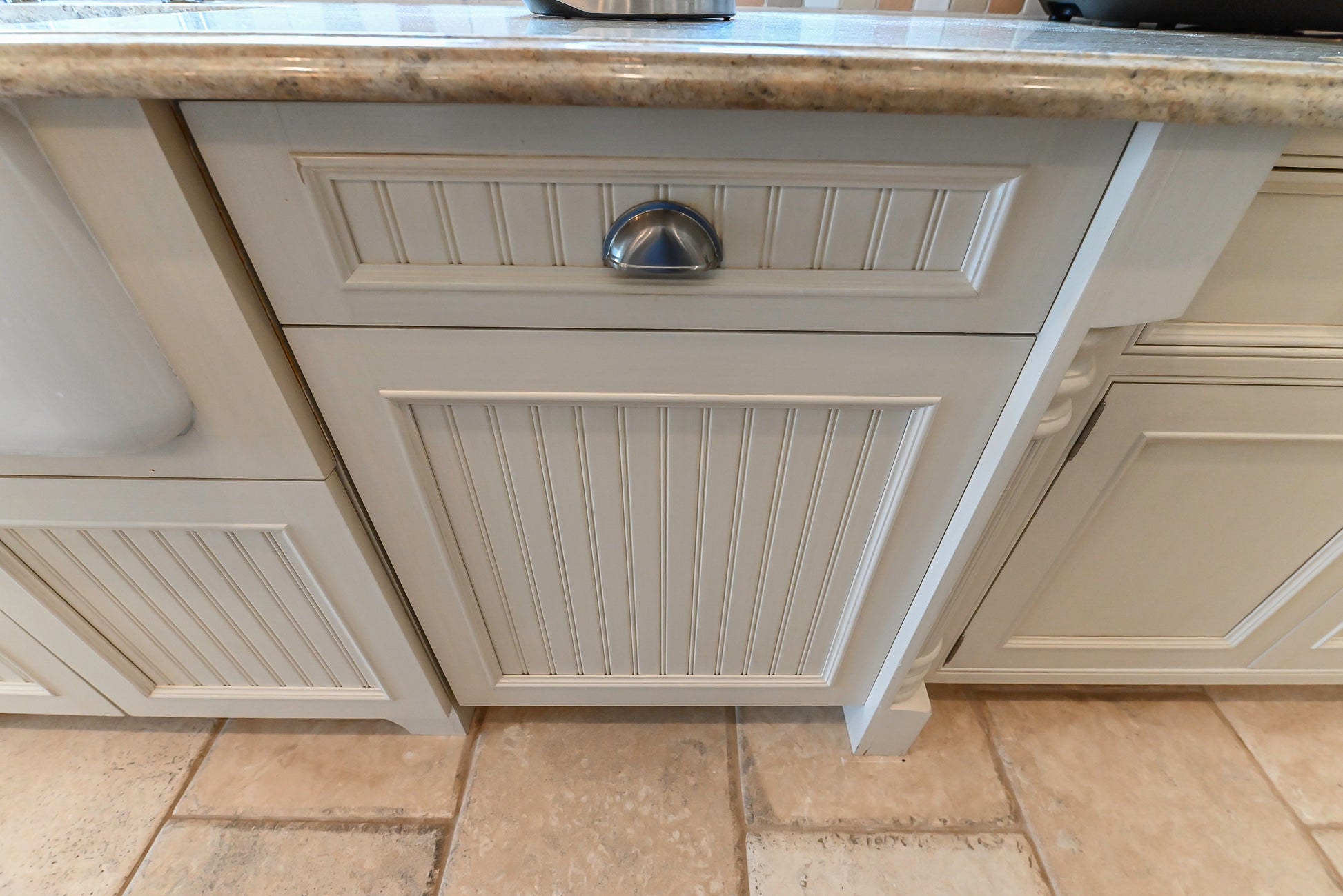 Craftmaid Traditional Off White Kitchen with Island, Granite Countertops & 48" Sub-Zero Refrigerator