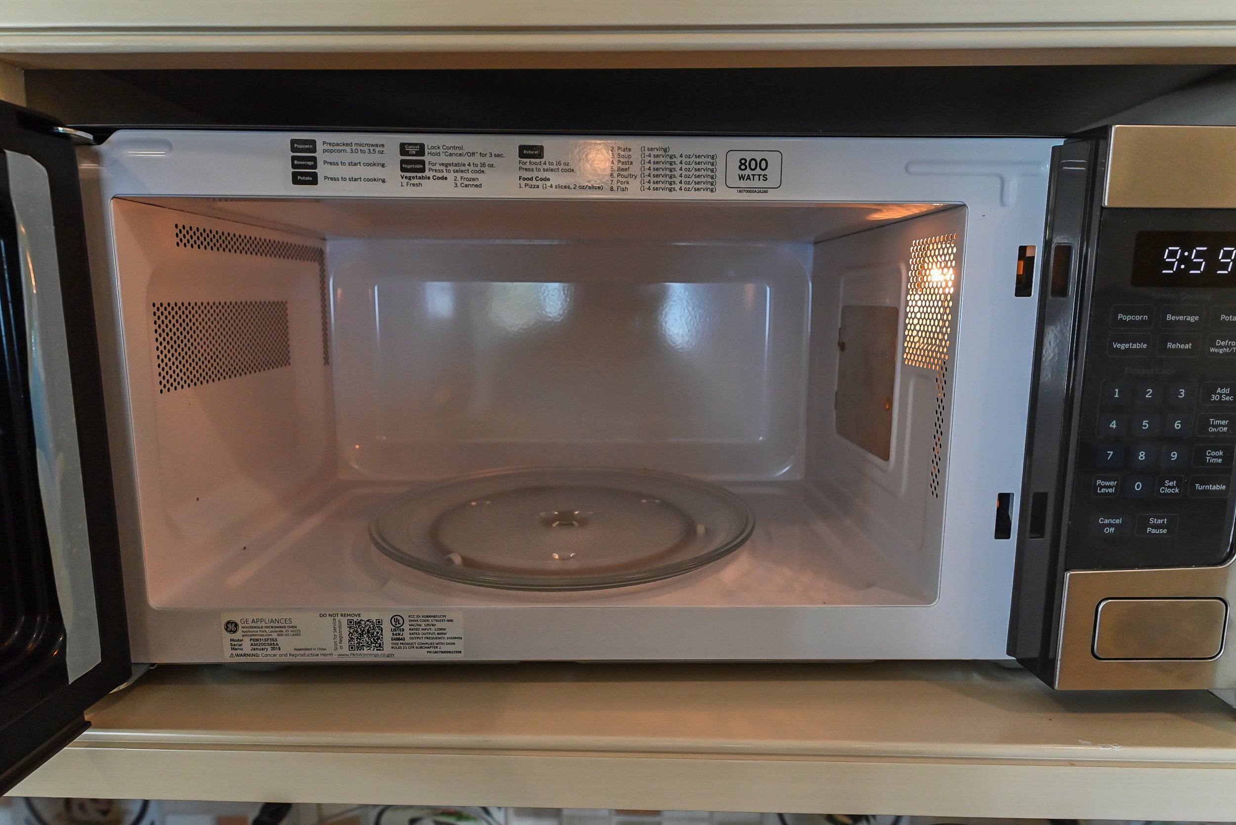 Craftmaid Traditional Off White Kitchen with Island, Granite Countertops & 48" Sub-Zero Refrigerator