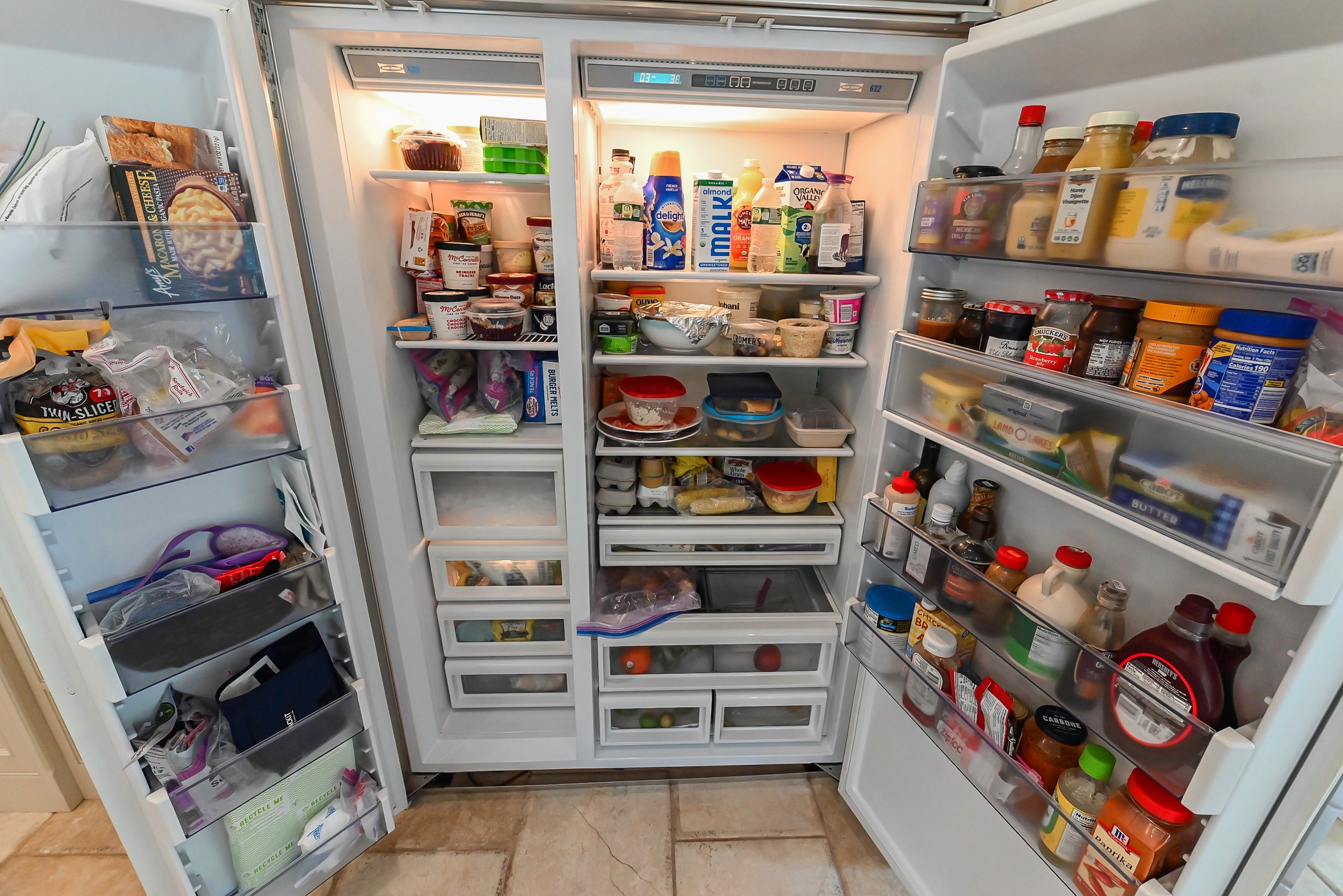 Craftmaid Traditional Off White Kitchen with Island, Granite Countertops & 48" Sub-Zero Refrigerator